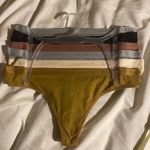 Brand new danskin thong pack. Size large. Fall colors.